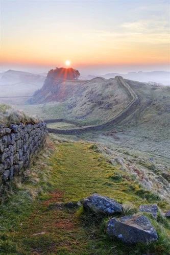 Hadrian's Wall (Latin: Vallum Aelium), also known as the Roman Wall, Picts' Wall, or Vallum Hadriani in Latin, is a former defensive fortification of the Roman province of Britannia, begun in AD 122 in the reign of the emperor Hadrian. Hadrian’s Wall, Hadrian's Wall, Roman Britain, Hadrians Wall, Places Around The World, Dream Vacations, Beautiful World, Travel Dreams, Great Britain