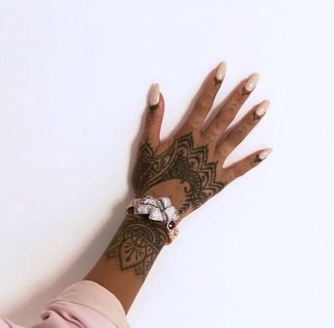 Rihanna hand tattoo                                                                                                                                                                                 More                                                                                                                                                                                 Mais Rihanna Nails, Rihanna Hand Tattoo, Rihanna Tattoo, Hand Tattoo Images, Mandala Hand Tattoos, Cuff Tattoo, Henna Inspired Tattoos, Hand Tattoos For Girls, Cute Hand Tattoos