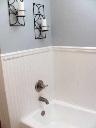 Love this new version MUCH better (and we saved skads of money by using beadboard instead of tile as the tub surround):    Masterbath3  (And by the way, yes, it's waterproof. We followed the advice of an issue of This Old House magazine and silicon-caulked the fire of that baby, inside and outside the beadboard.) Tile Tub Surround, Room Wall Tiles, Beadboard Bathroom, Top Bathroom Design, Bathtub Surround, Shiplap Bathroom, Tub Tile, Bead Board, Tub Surround