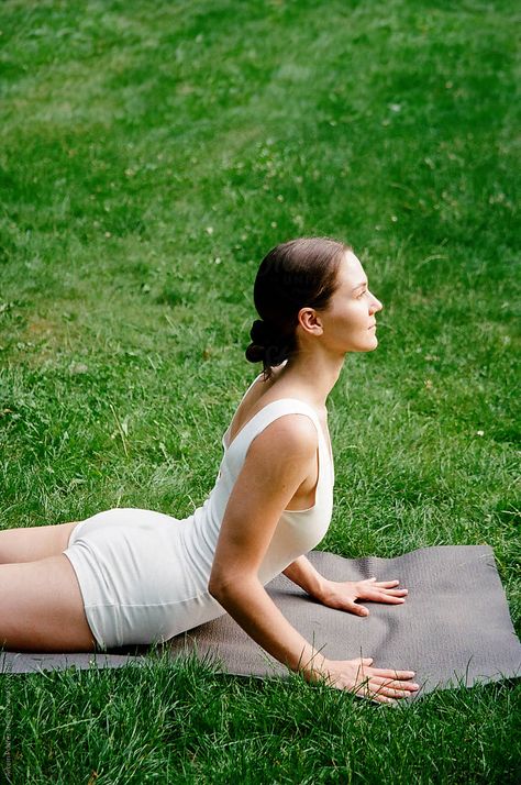 "Active Woman Embracing Yoga Practice In City Park. Cobra Pose" by Stocksy Contributor "Artem Podrez" - Stocksy Yoga Shoot, Yoga In The Park, Yoga Photoshoot Ideas, Yoga Photoshoot, Cobra Pose, Bridge Pose, Easy Yoga Poses, Tree Pose, Yoga Pictures