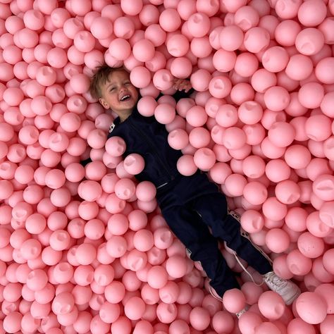 When you're a kid, nothing beats the pure joy of jumping into a ball pit! We love seeing happy faces like this little guy's at our events. At Nomads Event, we specialize in creating unforgettable moments for kids of all ages. From bounce houses and carnival games to face painting and balloon twisting, we've got you covered for all your kids' entertainment needs. Contact us today to learn how we can bring the fun to your next event! Bounce Houses, Happy Faces, Balloon Twisting, Carnival Games, Ball Pit, Bounce House, Pure Joy, Kids Entertainment, Event Styling