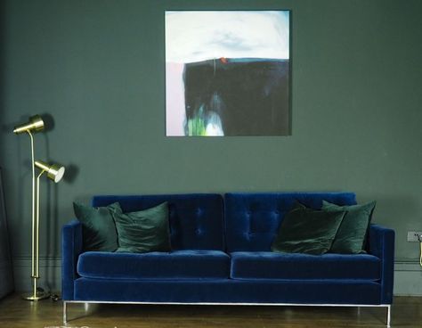 Accent Colors That Play Well With Navy Decor Green Wall Navy Sofa, Dark Green Wall Blue Couch, Navy Couch Dark Walls, Navy Couch Green Accents, Navy Couch Wall Color, Navy Sofa Green Walls, Accent Wall With Navy Couch, Blue Couch Blue Walls, Green Walls Blue Couch