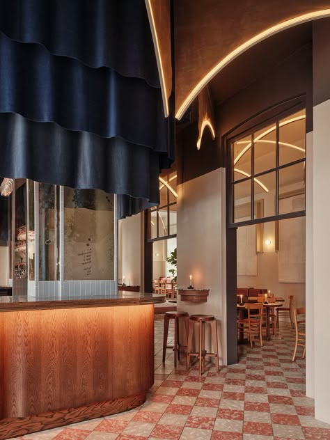 studio modijefsky revives delapidated cinema as de witt brasserie in dordrecht Historic Interior Design, Zinc Bar Top, Studio Modijefsky, Blue Velvet Curtains, Timber Tiles, Historic Colours, Parisian Bistro, Beige Curtains, Yellow Curtains