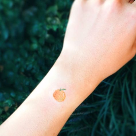 Cute minimal Tiny Colorful Fruit tatto ideas. Cute fruit tatto ideas. Colorful Tiny fruit Tatto ideas. Orange Tattoo Fruit Minimal, Mandarin Tattoo, Tattoo Fruit, Mini Tattoo, Dad Tattoos, Tattoos Ideas, Maple Leaf Tattoo, Tattoo Inspo, Jesus Fish Tattoo