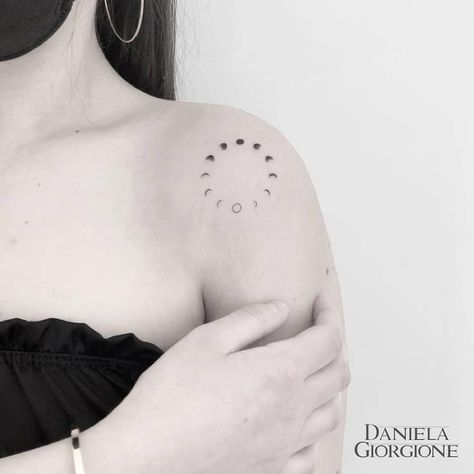 Moon Phases Tattoo Ideas That Celebrate the Night Sky | Discover moon phases tattoo ideas for an unforgettable design. Lifestyle Phases Of The Moon Outline Tattoo, Minimalist Tattoo Moon Phases, Romantic Moon Tattoo, Moon Phases Shoulder Tattoo, Moon Phase Circle Tattoo, Phases Of Life Tattoo, Tattoo Ideas Female Moon Phases, Moon Phases Tattoo Circle, New Moon Tattoo Ideas