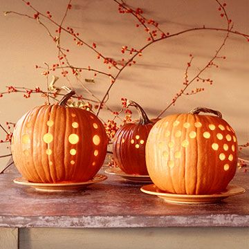 Design a unique pumpkin with peppy polka dots. See how it was done here: http://www.bhg.com/decorating/seasonal/autumn/fall-pumpkins-with-drilled-holes/?socsrc=bhgpin090212drilledpumpkins Diy Pumpkin Carving, Dekorasi Halloween, Polka Dot Pumpkin, Creative Pumpkin Carving, Carved Pumpkins, Halloween Fest, Labu Halloween, Pumpkin Carvings Stencils, Creative Pumpkins