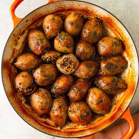 These Turkish stuffed onions are filled with a spiced beef, rice and herb mixture and baked in a rich tomato-pomegranate sauce, creating a comforting Middle Eastern-inspired meal. Turkish Mezze, Stuffed Onions, Pomegranate Sauce, Sweet Onions, Beef Rice, Spiced Beef, Food Types, Middle Eastern Dishes, Beef And Rice