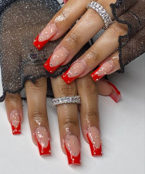 Red Tie Nails, Short Acrylic Red Nails Designs, Red Black And Blue Nails, Short Red Nail Designs Classy, Red Birthday Nails Acrylic Medium, Red Gemstone Nails, Red Acrylic Nails With Charms, Red French Tip Nails With Gems, Red Nails With Jewels