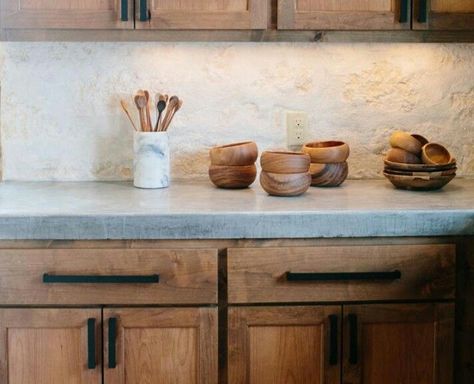 Palette - gray concrete countertop, textured cream walls, white marble look back splash. Medium wood tone accents. Countertops Black, Countertops Wood, Black Appliances Kitchen, Fixer Upper Kitchen, Countertops Concrete, Countertops White, Custom Kitchen Island, Concrete Kitchen, Wood Kitchen Cabinets