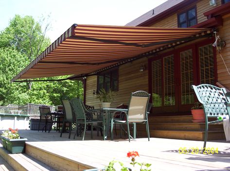 Retractable awnings can add the perfect ambiance to your deck or patio. With an awning that you can roll up when ever you want,  you don't have to worry about Rv Shades, Pergola Cost, Roll Out Awning, Deck Awnings, Fabric Awning, Awning Canopy, Backyard Pergola, Retractable Awning, Sliding Doors Interior