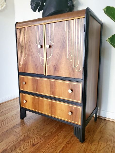 I got this art deco piece from my local Facebook marketplace. I'm not sure what it is actually. Is it a gentleman's chest? An armoire? A children's dresser? It is about 45 inches tall and it didn't really matter because I knew that in it's new lifetime it's going to be a bar! I started by disassembling the piece and took off the doors and hardware. Some of the hardware was missing, so right away I ordered some new ones from Amazon. That way they were there once I was finished with th… Art Deco Dresser Painted, Art Deco Upcycle, Art Deco Wardrobe Makeover, Art Deco Armoire Makeover, Art Deco Dressers, Painted Art Deco Furniture, Art Deco Cupboard, Art Deco Cabinet Makeover, Art Deco Wood Furniture