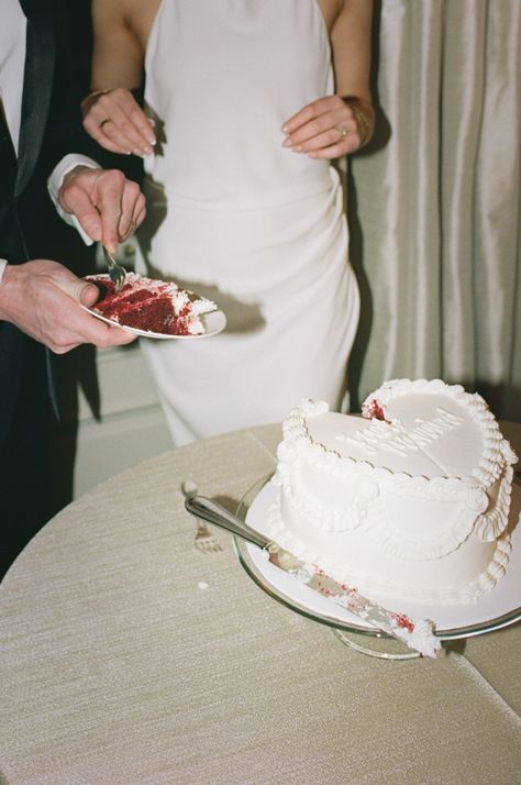 Couple share a piece of their red velvet wedding cake. Vintage, all white wedding cake with piping. 70s style.   At Graydon Hall Manor. Wedding Cake With Piping, Cake With Piping, All White Wedding Cake, Wedding Cake Vintage, Red Velvet Wedding, Heart Shaped Wedding Cakes, Graydon Hall Manor, Red Velvet Wedding Cake, Vintage Italian Wedding