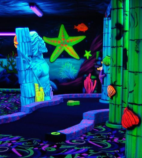 Blacklight Golf | Gatlin's Fun Center Sunken Pirate Ship, Blacklight Mini Golf, Spiderman Wall Decals, Giant Octopus, Neon Jungle, Graffiti Photography, Mini Golf Course, Miniature Golf, Tennessee Vacation