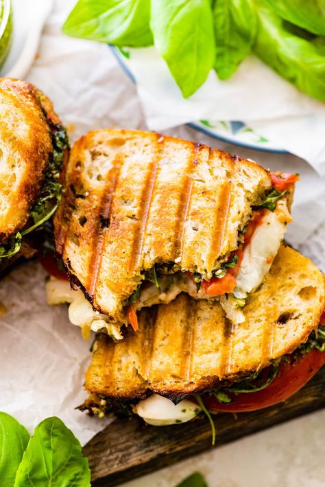 The Caprese Sandwich Recipe with Basil Pesto (Panini) perfectly balances flavors and textures. The creamy mozzarella contrasts with the juicy tomatoes, Basil Pesto Sandwich, Caprese Sandwich Recipe, Recipe With Basil, Caprese Panini, Pesto Panini, Homemade Basil Pesto, Tomato Caprese, Cottagecore Food, Pesto Sandwich