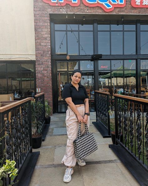 Outfits I wore from @myzudio recently ➡️ Pic 1: Oversized tshirt Rs. 299 (loved the quality even after wash) Bootcut jeans Rs. 800 (current favourite in my wardrobe, stretchable, the fit is just awesome) Pic 2: Olive A line dress Rs. 699 (the color is a winner, material and fit is also great for summers) Pic 3: Beige Parachute pants Rs. 499 (hated it at first but love it with proper styling) Black crop top Rs. 399 (Love the material and fit, in great shape even after multiple washes) P... Pant And Crop Top Outfit, Beige Parachute Pants Outfit, Beige Parachute Pants, Parachute Pants Outfit, Black Crop Top, Crop Top Outfits, My Wardrobe, Line Dress, College Outfits