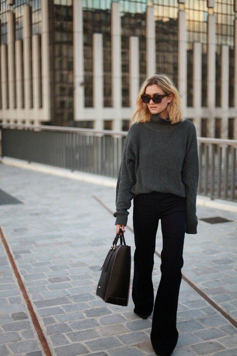 Shop this look on Lookastic:  https://lookastic.com/women/looks/charcoal-oversized-sweater-black-flare-jeans-black-tote-bag-dark-brown-sunglasses/7718  — Dark Brown Sunglasses  — Charcoal Oversized Sweater  — Black Flare Jeans  — Black Leather Tote Bag Black Flare Jeans Outfit, Black Flared Jeans, Minimalist Moda, Flare Jeans Outfit, Black Flare Jeans, Walking Down The Street, Chic Winter Outfits, Paris Mode, Outfit Jeans