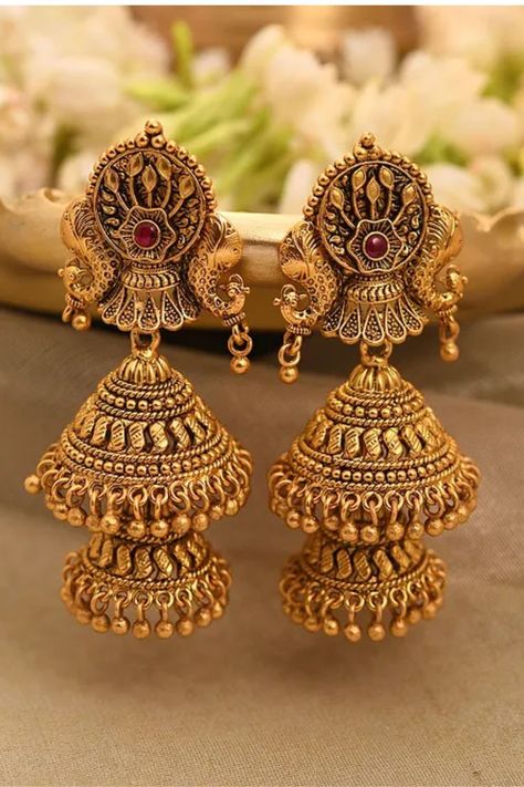 This product has been crafted by hand and may have slight irregularities or imperfections in color or embellishment. . #jewellery #rakshabandhan #indianjewellery #bridaljewellery #festivalsofindia #weddingjewellery #diwalifestival #jewellerylover #kundanjewellery #southindianjewellery #bangles #ethnic #traditionaljewellery #diwalispecial #jhumkas #fashionjewellery #templejewellery #oxidisedjewellery #imitationjewellery #polkijewellery #kundan #anklets Gold Buttas Designs, Jumkas Gold Indian Bridal, Kundan Anklets, Temple Jewellery Jhumkas, Latest Earrings Design, Temple Jewellery Earrings, Gold Jhumka, Antique Gold Earrings, Gold Jewels Design