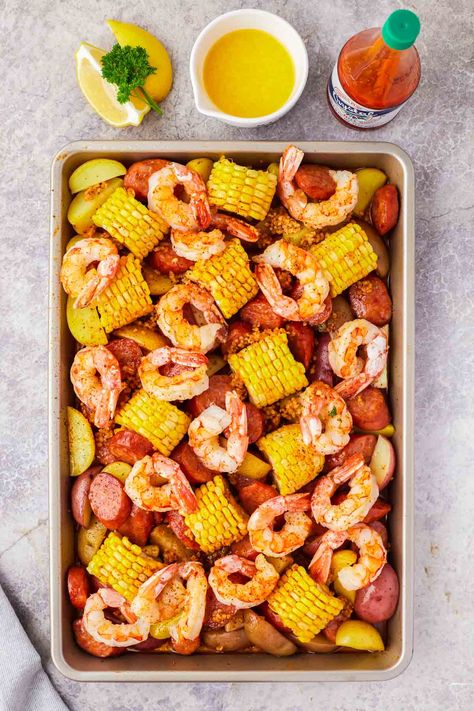 Sheet Pan Shrimp Boil (in the oven) Shrimp Boil In Oven, Low Country Boil Recipe, Sheet Pan Shrimp Boil, Pan Shrimp Boil, Oven Roasted Shrimp, Sheet Pan Shrimp, Pan Shrimp, Seafood Boil Recipes, Sheet Pan Dinners Recipes