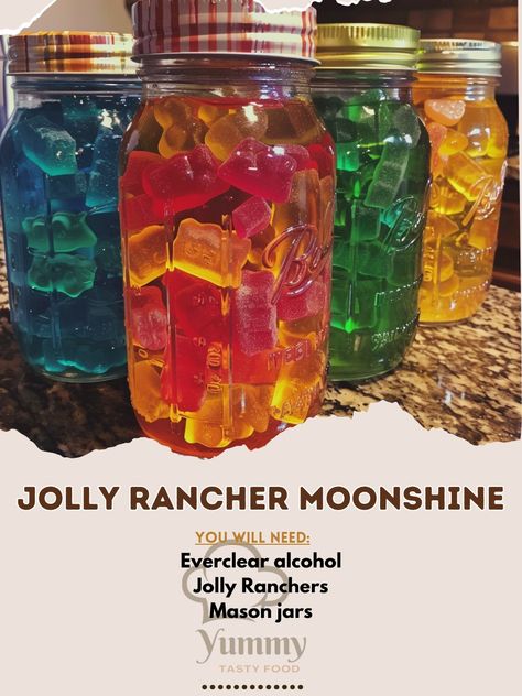 🍹 Light up your evening with vibrant, flavorful Jolly Rancher Moonshine! A sweet, zesty twist on a classic! 🍽️ Jolly Rancher Moonshine 🛒 Ingredients: Everclear alcohol: 750 ml Jolly Ranchers: 80 candies, assorted flavors Mason jars: 4 👩‍🍳 Instructions: Dissolve: Place 20 Jolly Ranchers in each mason jar. Combine: Pour Everclear, evenly distributing. Rest: Seal and let sit until candies dissolve, shaking occasionally. 🎉 Perfect for parties, our Jolly Rancher Moonshine is a colorful way to ... Jolly Rancher Moonshine, Flavored Moonshine Recipes, Making Moonshine, Alcohol Candy, Mason Jar Cocktails, Infused Liquors, Jolly Ranchers Candy, Cozy Fall Recipes, Homemade Liquor