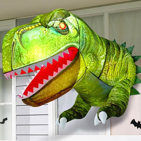 PRICES MAY VARY. Unique Design. This Halloween inflatable green dinosaur decoration has stunning visual effects, making it an unmissable centerpiece for your Halloween party. Product size 2.5 x 4.5 x 3.5 feet. Comes with an extended cord, suction cups, fastened ropes, and a plug with UL certification. Powerful Function. Our Halloween inflatable window dinosaur decoration features built-in LEDs lights that enhance its visual effects with bright lights. The lights intensifying its menacing appeara Jurassic Park Halloween, Window Decor Halloween, Halloween Setup, Dinosaur Halloween, Halloween Window Decorations, Dinosaur Birthday Party Decorations, Window Decorations, Green Dinosaur, Dinosaur Theme Party