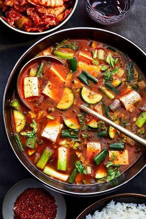 This stew recipe incorporates spicy tofu and zucchini to create the ultimate quick and easy fall recipe. Whether you’re looking to eat this zucchini recipe as a hearty lunch for a chilly fall day or as a quick and easy 30-minute weeknight dinner recipe, it’s a great way to incorporate fall flavors with the last of your summer zucchini.#vegetarianrecipes #veganrecipes #stewrecipes #souprecipes #zucchinirecipes #fallrecipes Tofu Zucchini, Zucchini Stew, Austria Recipes, Spicy Soups, Stew Fish, Shrimp Bisque, Spicy Crab, Zucchini Soup, Spicy Soup