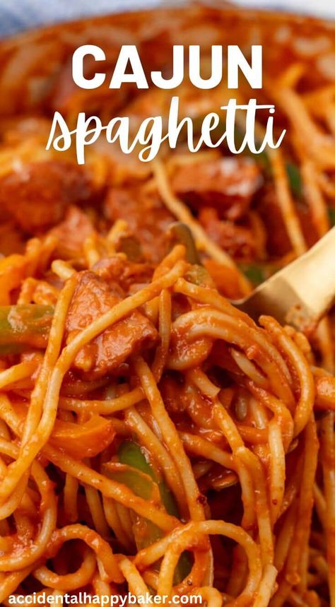 This Cajun Spaghetti is a quick and easy cajun pasta dish with andouille sausage, peppers, onions, and a tomato sauce with a zippy kick to it. From start to finish in less than 30 minutes, this main dish pasta is an easy way to switch up your weeknight spaghetti game! Andouille Sausage Spaghetti, Cajun Spaghetti Recipes, Easy Cajun Pasta, Pasta With Andouille Sausage, Cajun Spaghetti, Sour Cream Pasta, Sausage Peppers Onions, Cajun Sausage Pasta, Vegetable Slow Cooker