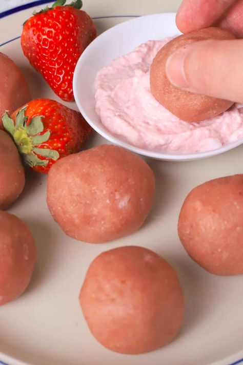 Discover a delightful treat with these strawberry protein bliss balls. Packed with protein and bursting with strawberry flavor, they make for a nutritious and satisfying snack. Try them today! Vanilla Powder, Strawberry Protein, Strawberry Powder, Strawberry Flavor, Protein Balls, Baked Strawberries, Bliss Balls, Protein Ball, Eat Well