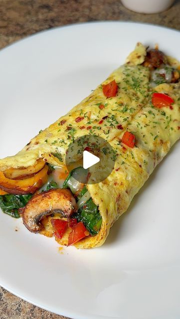 Saira Farhan on Instagram: "Loaded Veggie Cheese Omlete| (iHop Style)

I can have this omlete every day 😍 turns out just like you get at iHop or fancy restaurants! it’s packed with so much flavor & nutrients! If you’re on diet, this is a perfect carb-free breakfast. 

Ingredients:
•Eggs 1-2 ( Add 1tbsp milk, pinch of salt & 1/2 tsp chili flakes. Whisk until well combined) 
•Shredded Cheese (2-3 tbsp)
•Vegetables: 3-4 Sliced mushrooms, Handful of baby spinach, 1/2 bell pepper chopped
•Seasonings: 1/4 tsp black pepper, Red Chili powder, paprika, chili flakes + salt to taste

Method:
1. Add 1tbsp olive oil in a pan. Stir fry mushrooms until color changes. Now add spinach, bell pepper & seasonings. Stir fry for a minute or two. Take out & set aside.
2. Add 1tbsp oil in the same pan. Add whisk Breakfast With Peppers, Vegetable Omlet Recipes, Egg Omelette Ideas, Healthy Breakfast Omelettes, Eggs With Veggies Breakfast, Egg With Spinach Breakfast, Omlet Breakfast Ideas, Egg Omlette Ideas, Cabbage Omelet