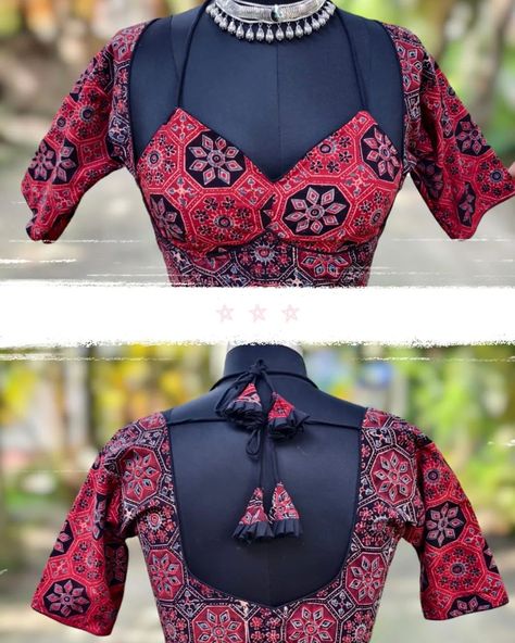 Price__650 free shipping *EXCLUSIVE COLLECTION* *AJRAKH MOMTAJ CUT BLOUSE* *PADDED* *BACK OPEN* *GLASS SLEEVES* *SIZE* *Chest upto 44 last* *Waist upto 40 last(ready* *size 34)* *Blouse length 15 inch* *Sleeves length 11 inch* *Cotton liling* *BEST QUALITY* Dm-Instagram ऑर्डर करने के लिए यहां व्हाट्सएप करें। *+919739484239*- *Resller welcome* *singl pis also available* How to Book? 1. Direct message @blousebymanushree or *Whatsapp* to *9739484239* Book your order and for fu... Blouse Cotton Designs, Ajrakh Blouse Designs Latest, Sleeves Less Blouse Design, Blouse Design With Sleeves, Blouse Models For Fancy Sarees, Back Open Blouse Designs, Ajrakh Blouse Designs, Blouse Designs Sleeves, Trending Sleeves Design