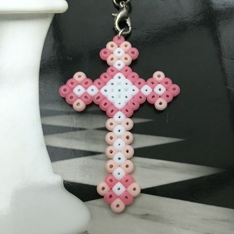 Bead Iron Pattern, Easy Iron Bead Ideas, Perler Bead Patterns Y2k, Pegboard Beads Ideas, Melty Bead Patterns Disney, Pink Perler Beads Ideas, Perler Beads Cross, Angel Perler Bead Patterns, Coquette Perler Beads