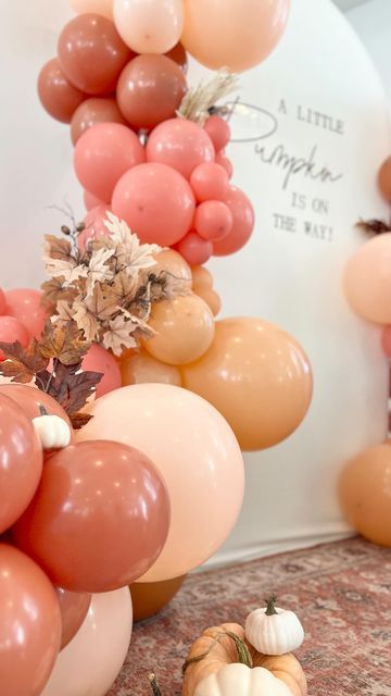 Becca Mansfield | Party Creator 🎉 on Instagram: "Comment “fall” for the supplies used to create this autumn baby shower backdrop! 😍 So cozy in all the colors of the season 🍁🍂

We loved celebrating the mama-to-be and sharing the special time with her before baby comes 🎀

Hope you find the extra backdrop and balloon tips helpful! I have lots more balloon tutorials in my highlight bubble “BOOTCAMP” 

++ Follow for more party DIYs and fun holiday reels coming soon! 🤩

🥳Becca 

…..

@helpingyougather chair and rug rental
@schervor my teammate for set-up, food display and decor
@sarahbushmancloward and @christineruthanderson hot cocoa cart setup 
…..
Baby Shower | Fall Baby Shower | Balloon Tutorial | Party DIY | Balloon Garland | Autumn Decor | Pumpkin Patch | A Little Pumpkin is On the Hot Cocoa Cart, Balloon Pumpkin, Balloon Tips, Balloon Tutorials, Yellow Balloons, Shower Backdrop, Diy Balloon, Before Baby, Baby Shower Backdrop