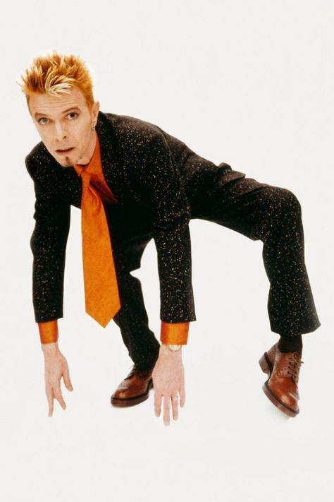 David Bowie dressed in Paul Smith suit during a fashion shoot for British GQ, London, August 5, 1997 © Peter Robathan David Bowie Dress, Bowie Fashion, Angela Bowie, Bowie Dress, Duncan Jones, David Bowie Fashion, David Bowie Ziggy, Space Oddity, Major Tom