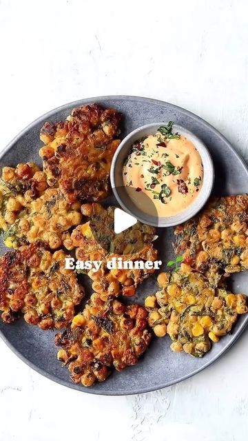 Easy Plant Based Recipes on Instagram: "You need to try these ✨Chickpeas Sweetcorn Fritters✨😋

By @Nadiashealthykitchen

They’re perfect as a light lunch or side dish. I also love hearing up leftovers in the morning to enjoy as a savoury breakfast 😍

As well as being delicious, they’re also a great source of protein and fibre! 🙌🏼

INGREDIENTS

80g chickpea (gram) flour
1/2 tsp salt
1/4 tsp baking powder
1 tsp curry powder
1 tsp paprika
1/2 tsp chilli powder
1/2 tsp cumin
1/4 tsp black pepper
1 tbsp lemon juice
80ml ml water
1x (400g) canned chickpeas drained and rinsed
80g frozen sweetcorn thawed
1/4 red onion finely chopped
2 garlic cloves crushed
handful of fresh coriander chopped

INSTRUCTIONS

In a bowl, mix together the flour, salt, baking powder and spices.
Pour in the water and Garbonzo Beans, Sweetcorn Fritters, Savoury Breakfast, Ic Recipes, Healthy Beans, Plant Based Recipes Easy, Source Of Protein, Plant Based Cookbook, Tasty Vegetarian Recipes