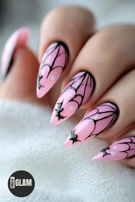 Looking to add a touch of sweetness to your Halloween look? Check out these stunning pink Halloween nails! Whether you prefer acrylic or gel, these pink nail designs are perfect for getting in the spooky spirit with a stylish twist. From pastel pink hues to bold neon shades, you'll find the perfect pink nail art ideas to amp up your Halloween style. Embrace the season with a pop of pink on your nails and stand out from the crowd at any haunted gathering. Pink And Blue Halloween Nails, Nails Pink Halloween, Black Pink Halloween Nails, Neon Pink Halloween Nails, Pink Vampire Nails, Halloween Neon Nails, Pink Halloween Nail Designs Short, Light Pink Halloween Nails, Pastel Goth Nail Art