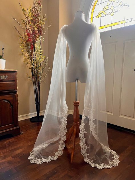 This Wedding Cover Up with lace is exquisite. Introducing our exquisite shoulder veil – a perfect solution for brides seeking a touch of arm coverage on their special day. Designed to provide confidence and comfort, this veil adds a graceful touch to any gown. Embrace your beauty with style and ease. #BridalFashion #ConfidentBride #ShoulderVeilMagic Shoulder Veil, Traditional Veil, Wedding Dress Separates, Bride Planning, Wedding Consultant, Crepe Gown, Illusion Tulle, Tulle Sleeves, For Wedding Dress