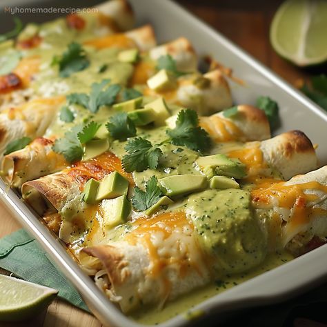 A Mexican-inspired dish with shredded chicken and diced avocados, wrapped in tortillas and topped with a creamy avocado sauce and melted cheese. Healthy Creamy Chicken Enchiladas, Chicken With Avocado Sauce, Chicken And Avocado Enchilada In Creamy Avocado Sauce, Creamy Avocado Chicken Enchiladas, Chicken And Avocado Enchiladas, Avocado Chicken Enchiladas, Chicken Avocado Enchiladas, Avocado Enchiladas, Shredded Chicken Enchiladas