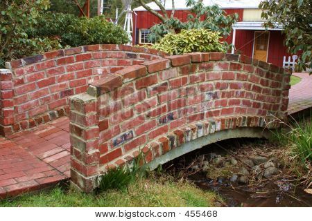 brick bridge 05 Brick Bridge, House Bridge Walkways, Bridge Between Buildings, Arched Bridge Over Creek, Connecting Bridge Between Buildings, Walk Idea, Brick Garden, Garden Stairs, Driveway Design