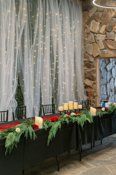 Christmas wedding head table decorations! #christmaswedding #tabledecor #christmastabledecor #candles #lightwall #buffalocheck Winter Wedding Bride And Groom Table, Christmas Wedding Head Table, Christmas Wedding Mr And Mrs Table, Christmas Wedding Head Table Decor, Christmas Wedding Bride And Groom Table, Christmas Sweet Heart Table Wedding, Head Table Decorations, Head Table Sign, Registration Table