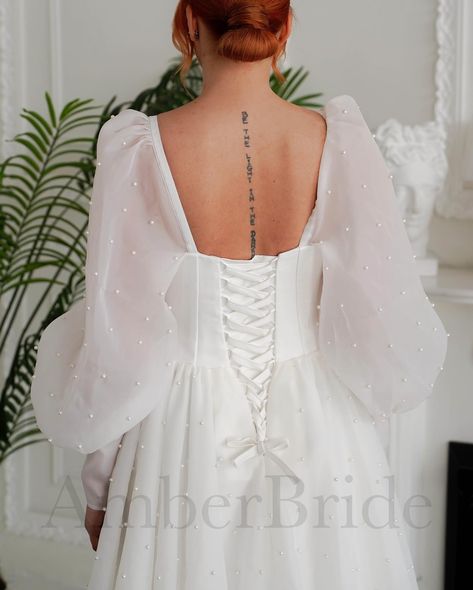 ☘️☘️☘️ #modestweddingdress #pearldesign #bishopsleeves #minimalistweddingdress #ballgown #bridalgown #simpleweddingdress #fairyweddingdress #weddingdress #weddinggown #bridalgown #bridedress #bridestyle Wedding Dress With Bishop Sleeves, Dress With Bishop Sleeves, Fairy Wedding Dress, Cape Wedding Dress, Organza Wedding Dress, Organza Wedding, Minimalist Wedding Dresses, A Line Wedding Dress, Cape Dress