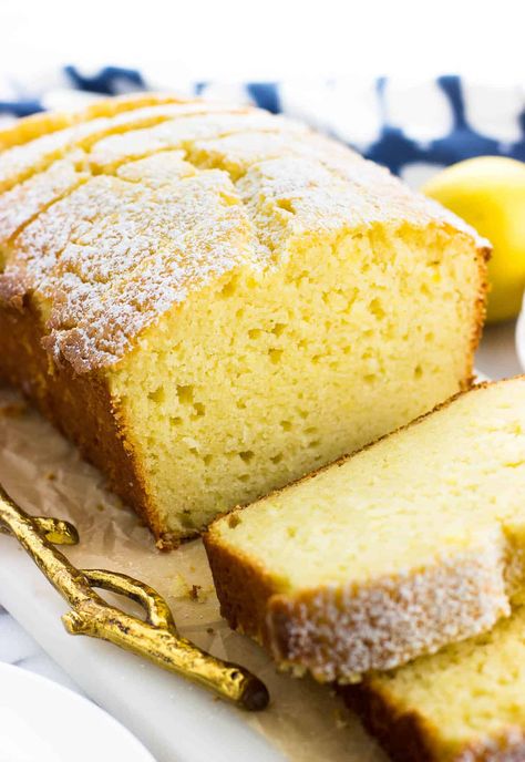 This lemon yogurt cake recipe produces a soft and tender loaf cake bursting with lemon and made with a blend of oils for a fun flavor addition. It's perfect for brunch and dessert alike! Lemon Loaf Cake Mix Recipes, Cottage Cheese Lemon Cake, Healthy Lemon Loaf Recipe, Greek Yogurt Loaf Cake, Lemon Greek Yogurt Cake, Lemon Syrup Cake Greek Yogurt, Lemon Loaf With Yogurt, Yoghurt Lemon Cake, Lemon Yogurt Loaf Cake