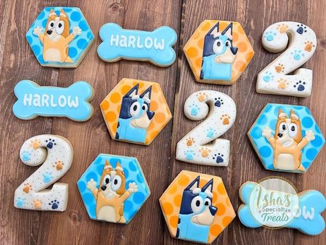 Isha's Specialty Treats on Instagram: "How cute are these ?! Bluey Cookies for 2nd Birthday. I love how this set came together. I go back and forth a lot with myself on how I want a set to come together. Even as I work lol it's constantly me changing my mind 😬. Ultimately this one came together perfectly ! #ishspecialtreat #blueycookies #birthdaycookies #2ndbirthday #decoratedsugarcookies #sugarcookies #royalicing #blueandorange" Blue Royal Icing Cookies, Royal Icing Cookies Bluey, Bluey Birthday Cookies For Boys, Bluey Cookie Ideas, Bluey Cookie, Bluey Cookies For Boys, Bluey Treats, Bluey Cookies For Girl, Bluey Cookies Decorated