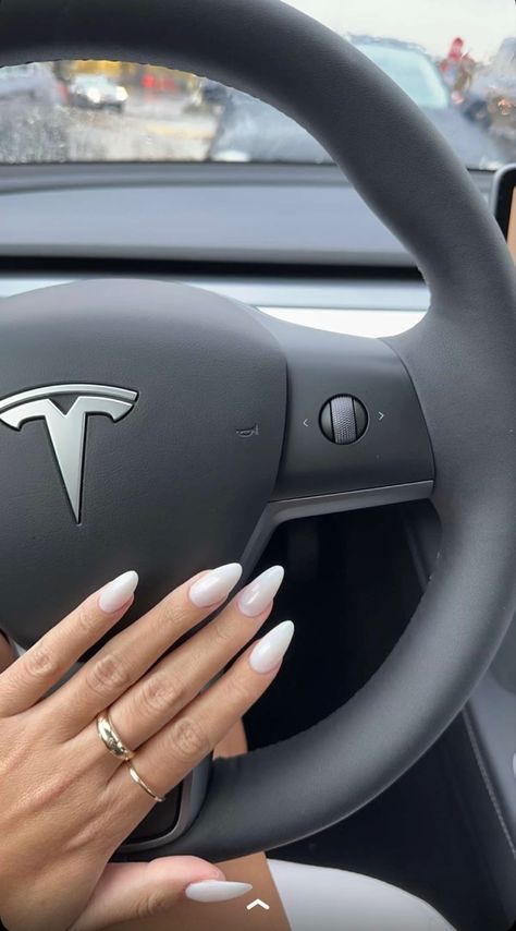 Nails On Steering Wheel, Tesla Manifestation, Tesla Aesthetic Girl, Tesla Steering Wheel, Tesla Car Aesthetic, White Tesla, Tesla Aesthetic, Milky White Nails, Tesla Wheels