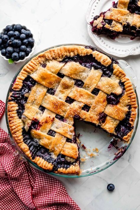 This better-than-ever homemade blueberry pie is bursting with a sweet juicy blueberry filling that pairs perfectly with a golden-brown buttery, flaky pie crust. The filling sets perfectly and is neither soupy nor runny. Your time and effort will be rewarded with every satisfying from-scratch slice! Recipe on sallysbakingaddiction.com Best Blueberry Pie Recipe, Easy Blueberry Pie, Fresh Blueberry Pie, Blueberry Pie Recipe, Homemade Blueberry Pie, Easy Pie Crust, Easy Blueberry, Fruit Pie, Pie Crust Recipes