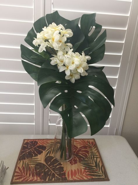 Monstera Arrangement, Floral Arrangements With Monstera Leaves, White Tropical Floral Arrangements, Jungle Themed Floral Arrangements, White Tropical Arrangement, Vase With Monstera Leaf, Floor Vase Decor, Tropical Floral Arrangements, Tropical Flower Arrangements