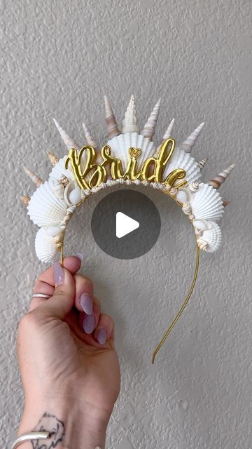 In this video, I make a crown that is made of sea shells and says "Bride" in the middle. Using different shapes of sea shells I can use pointy shells to mimic the points of a crown and round shells to add on the base of the crown. She ended up loving it at her intergalactic mermaid bachelorette! Bride To Be Crown Diy, Last Splash Mermaid Bash Bachelorette, Bachelorette Party Mermaid Theme, Bridal Shower Mermaid Theme, Mermaids And Matrimony, Sea Bachelorette Party, Sea Themed Bachelorette Party, Bachelorette Mermaid Theme, Seashell Bachelorette Party