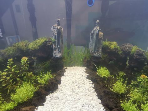 LOTR themed aquascape Lotr Fish Tank, Lord Of The Rings Fish Tank, Beta Aquarium, Axolotl Tank, Aquarium Ideas, Gamer Room Decor, Aquascape Aquarium, Fish Tanks, Aquarium Decor