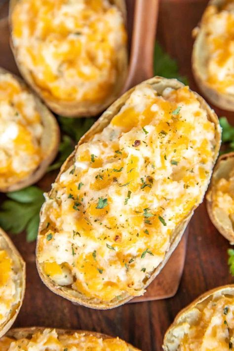 Million Dollar Twice Baked Potatoes – the BEST potatoes EVER!! Loaded with three types of cheese! Can make in advance and freeze for later. Baked potatoes, sour cream, cream cheese, cottage cheese, cheddar cheese, butter, garlic, salt, and pepper. Easy enough for a weeknight and fancy enough for a dinner party! Make these ASAP! #potatoes #bakedpotatoes #cheese Potato Side Dishes Easy, Chicken Easter, Potatoes Baked, Layered Salad Recipes, Cheese Cheddar, Cheese Butter, Layered Salad, Plain Chicken, Potato Sides