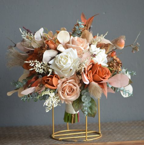 Rustic Orange Bouquet, Artificial Fall Wedding Bouquets, Dusty Rose And Burnt Orange Wedding Colors, Peach And Orange Bridal Bouquet, Burnt Orange Centerpieces Wedding, Burnt Orange And Pink Wedding, Burnt Orange Wedding Flowers, Fall Wedding Bridal Bouquets, Pink Fall Wedding