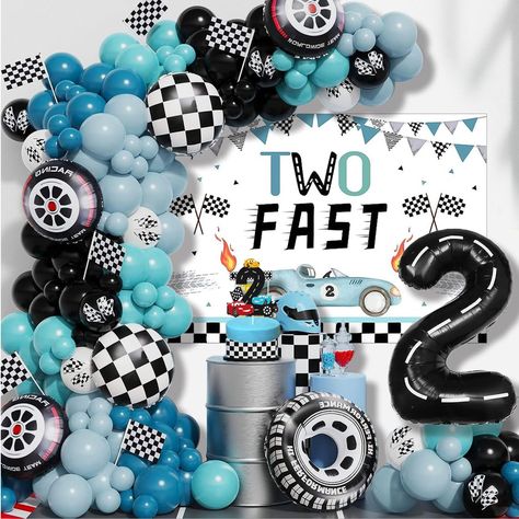 PRICES MAY VARY. 🚜【What you will get in this Two Fast Birthday Decor Package】Giant 40" black number 2 balloon X1, Light Blue TWO FAST racing car backdrop X1, 36" black tire balloonX1, black tire balloon 18" X2, 18" black white grid balloon X2, 10" latex balloon X60, 12" balloon X10, 5" balloon X20, Cake topper X1, Balloon Strip X1, Glue dotsX100, totally 99 pcs, a complete 2 fast racing car birthday party decorations set with everything you needed ! 🚜【Easy to Set Up】DIY a TWO FAST Birthday Par Boys Birthday Theme Ideas, Two Fast Birthday Decor, Tire Balloon, Two Fast Birthday Party Boy, Fast Birthday Decorations, Car Birthday Party Decorations, Two Fast Two Curious, Car Backdrop, Backdrop Balloon Garland