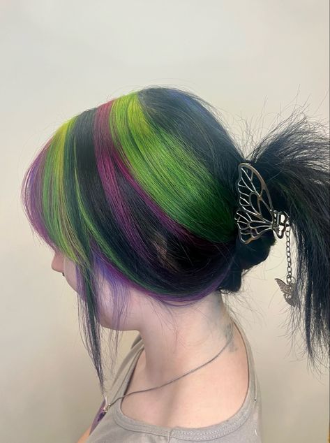 green, magenta, purple, black, striped hair. Chunky highlights Chunky Highlights Scene Hair, Purple And Green Hair Streaks, Black Hair With Rainbow Streaks, Green Black And Purple Hair, Black Hair Magenta Highlights, Cute Hair Colors For Dark Hair, Green And Black Chunky Highlights, Black Hair Colorful Highlights, Green Hair With Blonde Highlights